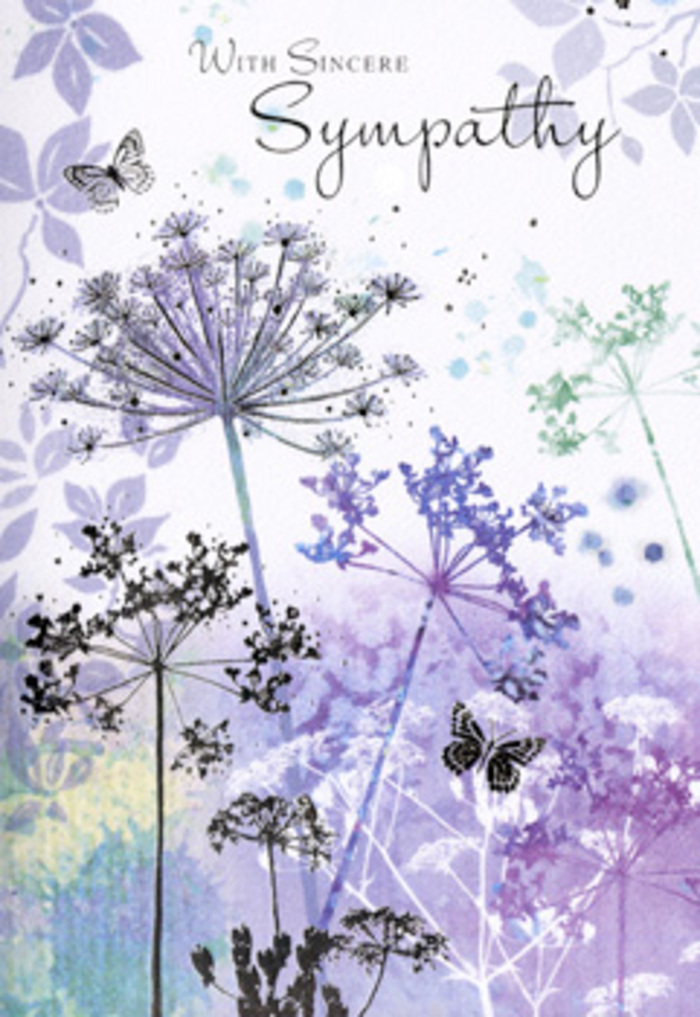 The artwork on this sympathy card captures the same gentle stillness you might feel walking the edges of Malden Rushett's fields on a calm evening. Slender, branching stems of umbelliferous blooms rise from the bottom edge, painted in soft gradients of violet, lavender, and silvery sage. Each stem forks delicately, ending in lace-like flower heads that appear almost weightless, as if made of fine mist. Around them, a dreamy wash of muted purples and cool greens blends seamlessly, suggesting distant foliage blurred by a soft-focus lens. The background is neither flat nor busy-it glows faintly, as though lit by diffused, cloud-filtered light. Scattered among the airy petals, subtle butterflies hover with wings held open, rendered in the palest tones so they seem to hover between presence and memory. Their inclusion brings a quiet sense of continuity, like the gentle movement of life carrying on beyond what we can see. The card's design is balanced and spacious, its silence giving as much comfort as any words. As a florist serving families in and around Malden Rushett, I often see people drawn to this kind of motif when they want their condolences to feel peaceful rather than heavy-something that pairs beautifully with simple white and lilac tributes delivered to homes along Rushett Lane or to nearby country churches. The overall impression is a tender, reflective landscape made of colour and line, offering sympathy that feels sincere and thoughtfully considered.