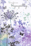 This sympathy card presents a tranquil, painterly view reminiscent of the quiet verges around Malden Rushett at daybreak. From the lower edge, tall, fine-lined wildflower stems reach skyward, branching into delicate umbels that resemble tiny fireworks frozen in soft motion. They are coloured in layered shades of dusky lavender, muted purple, and blue-tinted grey, with hints of silvery green that echo distant hedgerows. The blossoms are semi-transparent at their tips, letting the watercolour background gently show through, which adds to the sense of airiness and light. Behind them, the card is washed with feathered strokes of violet and soft green, merging like a faint horizon half-hidden by morning fog along Fairoak Lane. Butterflies drift throughout the scene, barely defined yet unmistakable, their fragile wings conveying ideas of transformation, spirit, and quiet companionship in grief. The lighting feels soft and indirect, with no harsh shadows, only a calm, even glow that invites contemplation. As a local florist, I recognise how this artwork harmonises beautifully with understated funeral flowers-a spray of lilac, white, and soft foliage chosen for a service or a home condolence visit in Malden Rushett. The mood is neither dark nor overly ornate; it is tender, respectful, and gently reassuring, like a friend's hand resting lightly on your shoulder when words are difficult to find.